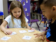 Students placing growth sequence cards in order.