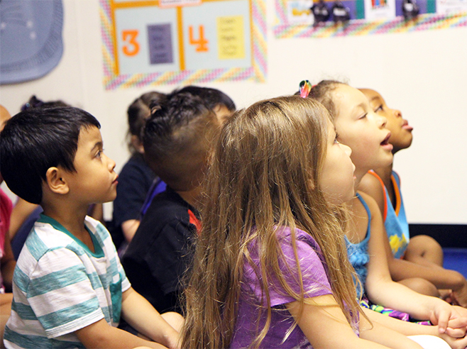 Students listening to the story.
