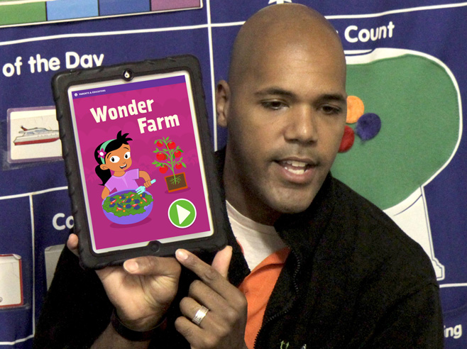 Teacher introducing iPad app.