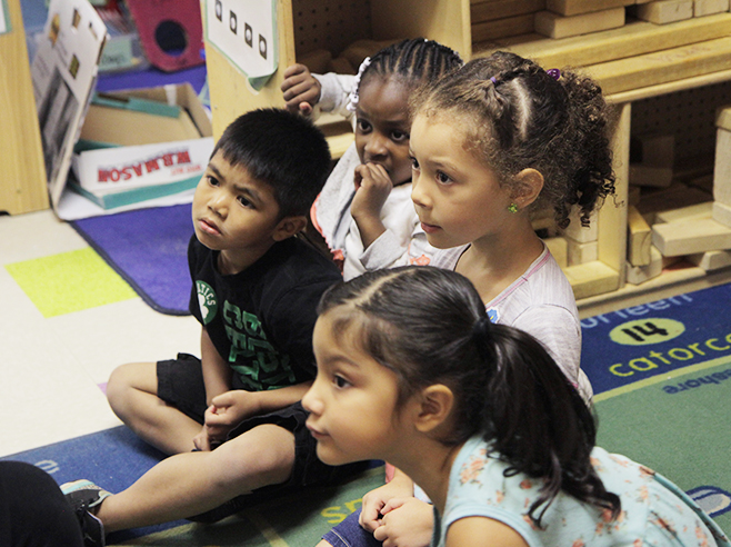 Students listen to teacher.